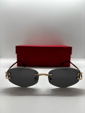 Rimless Oval Sunglasses in Black and Gold with Red Case